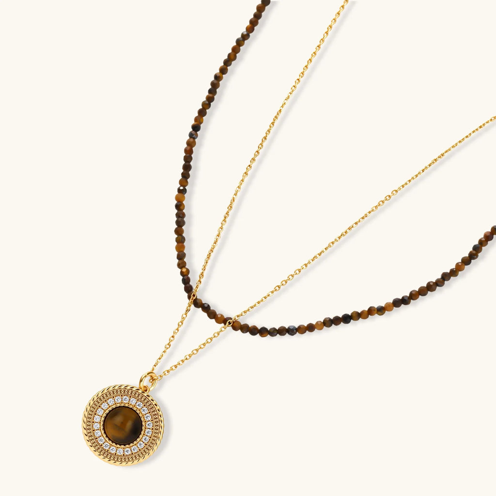 Gold plated eco-brass set with brown cat-eye stone pendant, beaded brown necklace and matching round zirconia halo stud earrings.