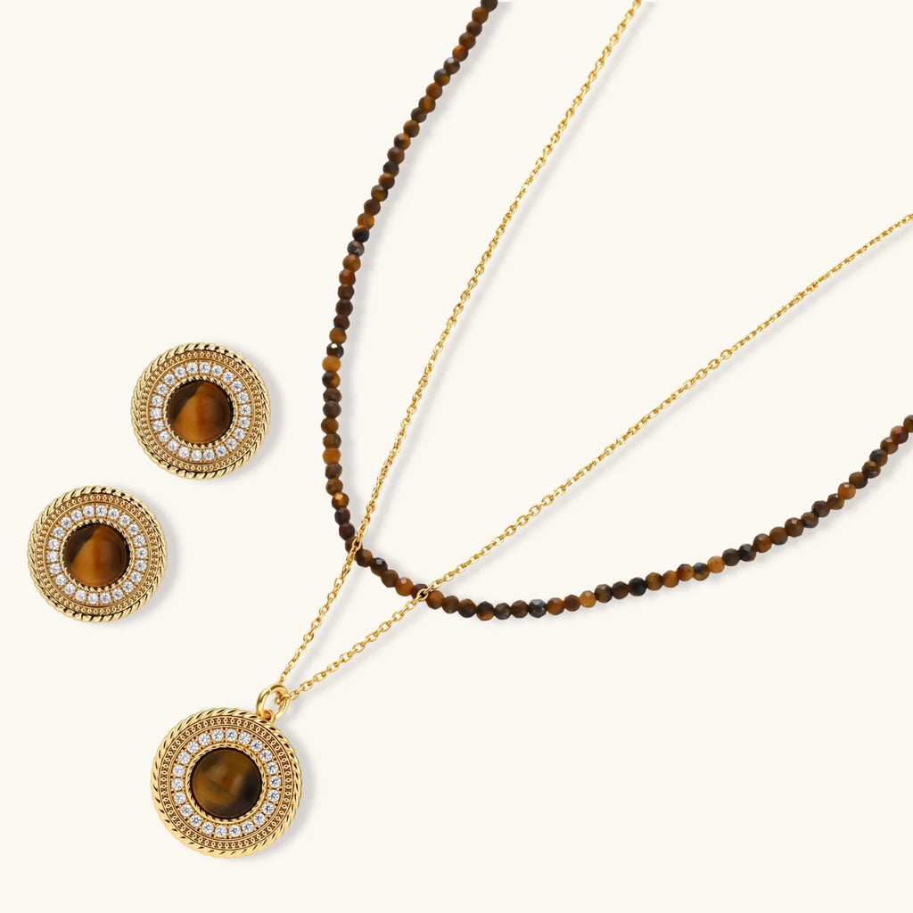 Gold plated eco-brass set with brown cat-eye stone pendant, beaded brown necklace and matching round zirconia halo stud earrings.