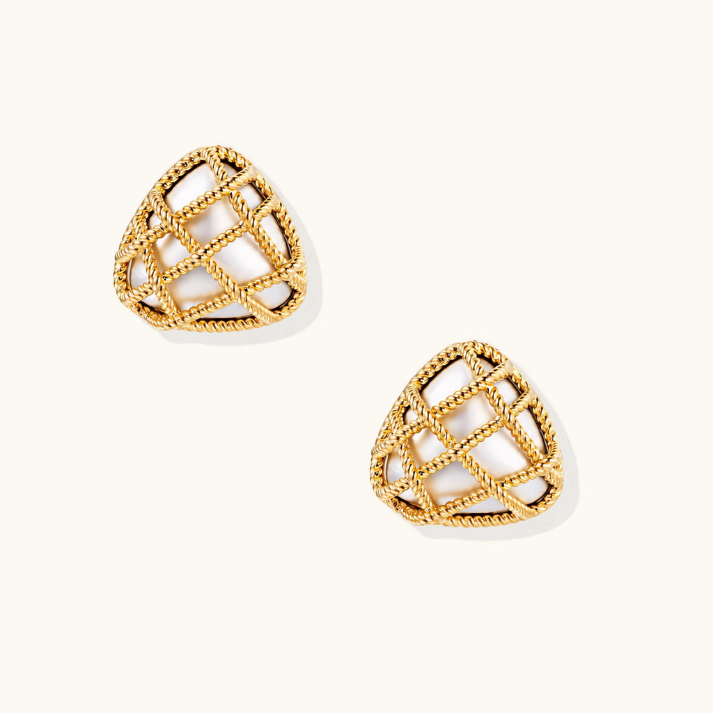 Pair of triangular gold-plated earrings with rope-textured lattice pattern on cream background, dimensional stud design