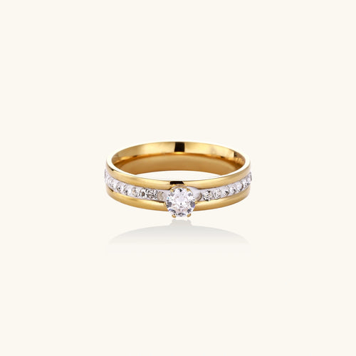 Gold-plated double-band ring with center rhinestone solitaire and channel-set stones on white background