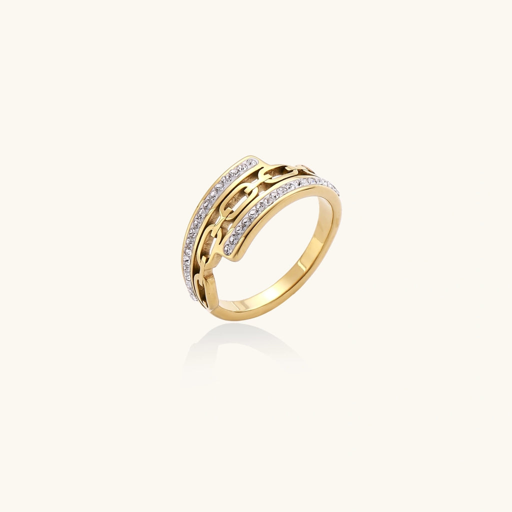 Gold-plated stainless steel ring with geometric chain link design flanked by two rows of clear rhinestones